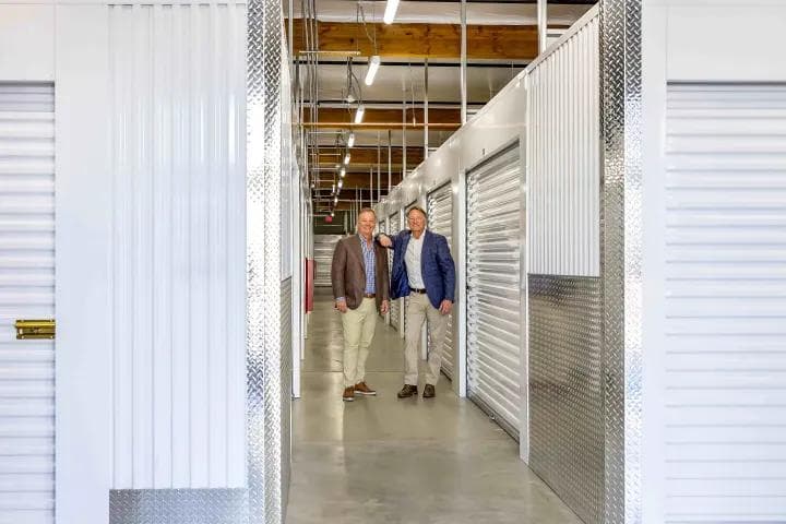 Phil Johnson (left) and Bill Hobin (right) inside StorQuest Self Storage in Stockton, CA